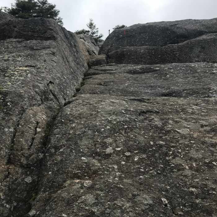 Scrambling up to the summit of Bald Mountain Near Bald Mountain/Artists Bluff Loop