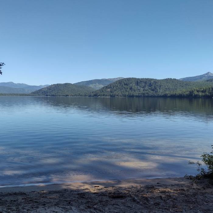 Upper Priest Lake as seen from one of the sandy beaches at Plowboy trail camp. Near Plowboy Mountain Navigation Loop