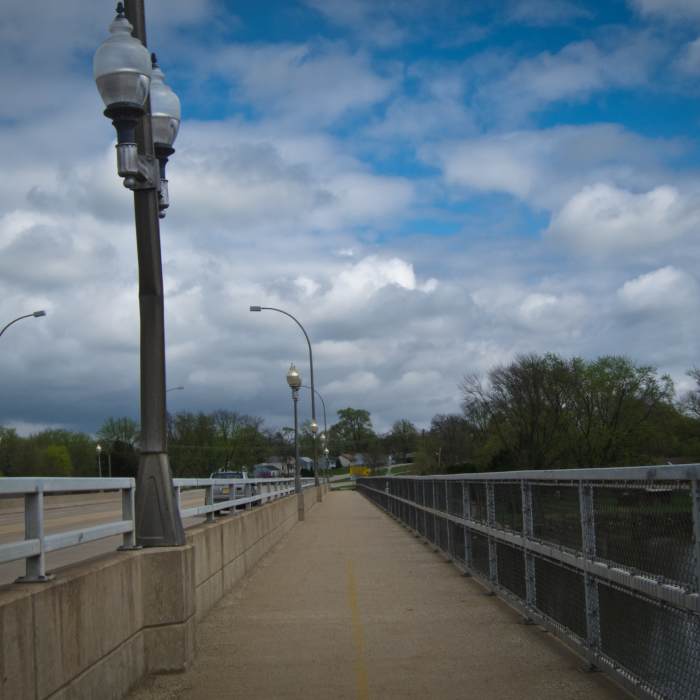 The Rock River Recreation Path is separated from traffic by a concrete barrier on the Harlem Road Bridge. Near Rock River Recreation Path