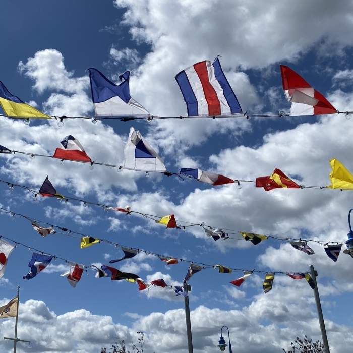 Nautical flags add to the decor of the the floating dock for the paddle boats. Near Valley View Drive