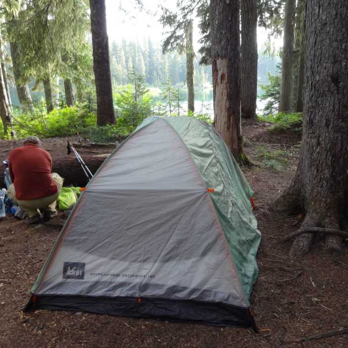 Setting up camp at lower Flapjacks Lake while hiking the Gladys Divide Trail. Near Gladys Divide Trail