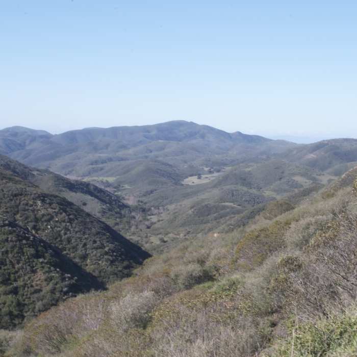 Peering through the canyon from the junction of Danielson Road (Old Boney Trail) and Hidden Valley Overlook Trail. Near Rancho Sierra Vista Loop