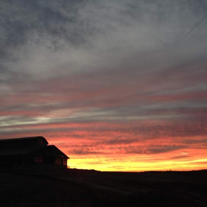 Sunrise over Shelby Farms visitor center in late December. Near Shelby Farms Greenline