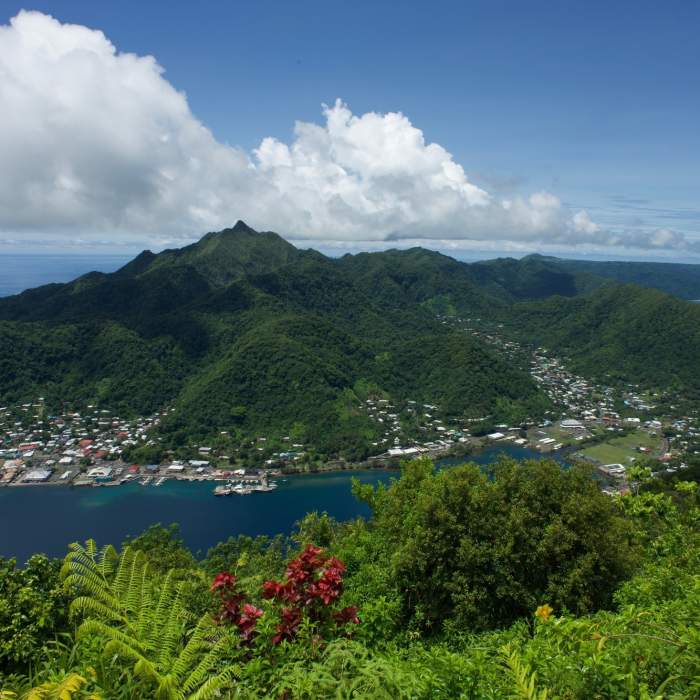 Looking across the bay, you can see Matafao Peak towering over Pago Pago. Near Mount 'Alava Trail