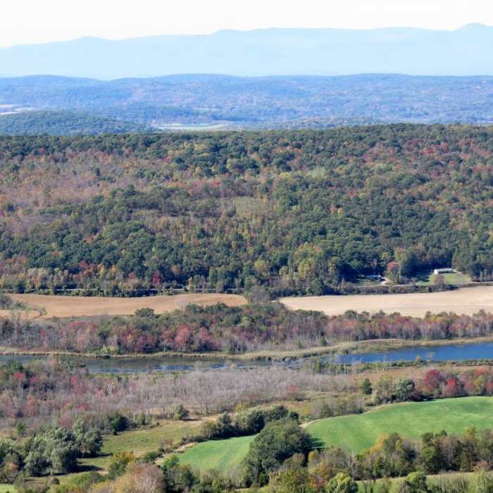 The summit of Brace Mountain offers a colorful view of the Hudson Valley with the Catskill Mountains far in the background Near Brace Mountain Out-and-Back