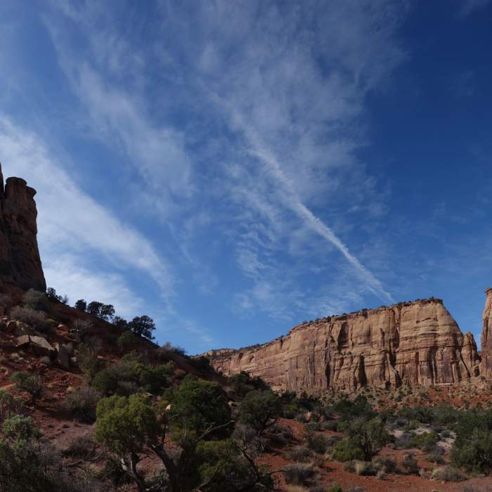 Independence Monument (left) and the Pipe Organ formation (center right) Near Monument Canyon and Wedding Canyon
