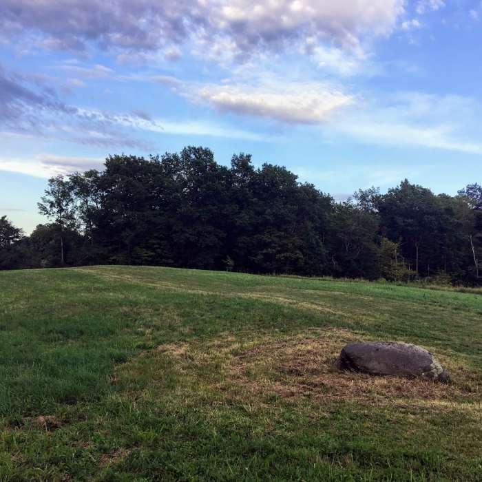 A mysterious boulder amidst the mowed Knox fields, near the entrance to the "secret" woods cut-through Near Knox Farm Medium Loop