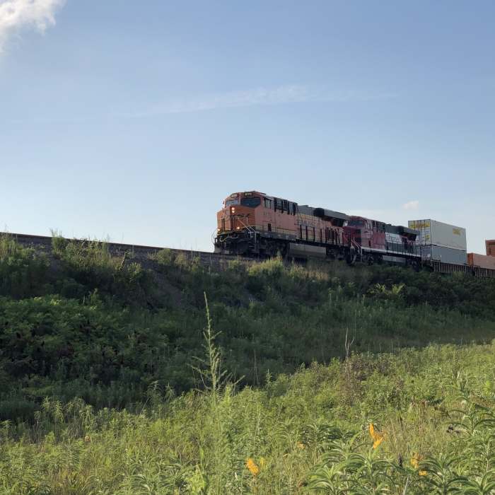BNSF Train coming by the station. Near PrairyArt Path