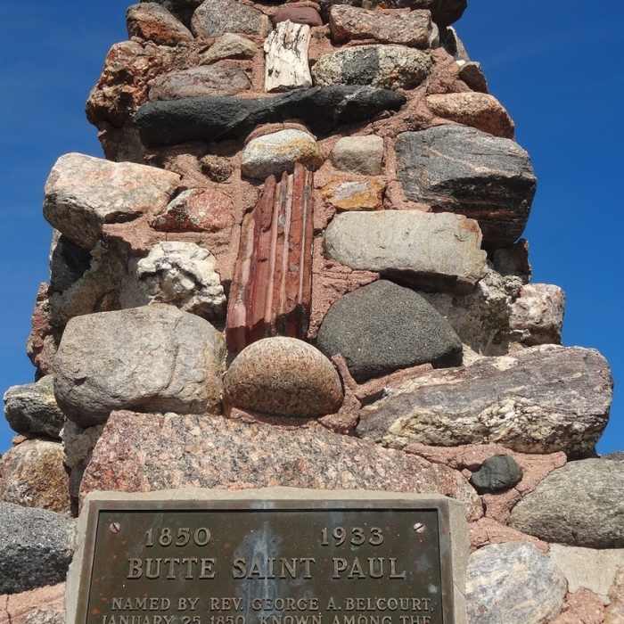 The historical monument at the top of the Butte St. Paul trail. Near Butte Saint Paul