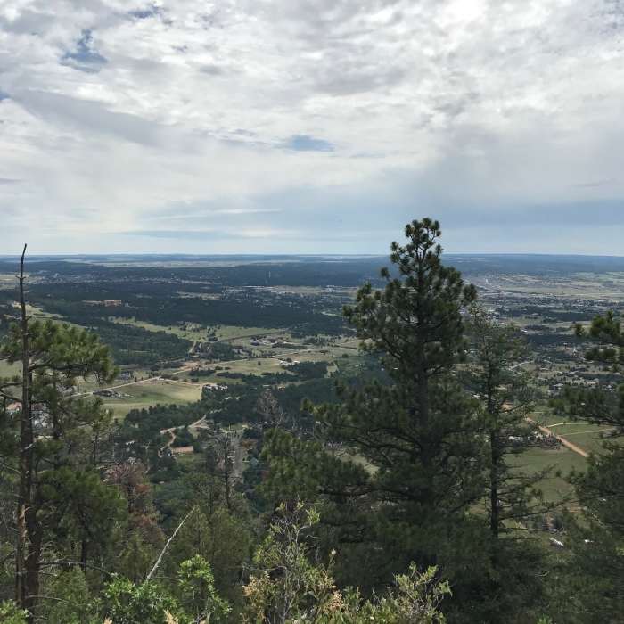The view eastward over Palmer Lake and Monument from the top of Chautauqua Mountain Near Chautauqua Trail