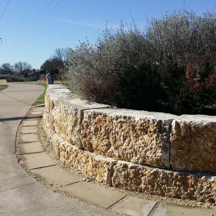 Well-maintained planters adorn the trail. Near Owens Trail South