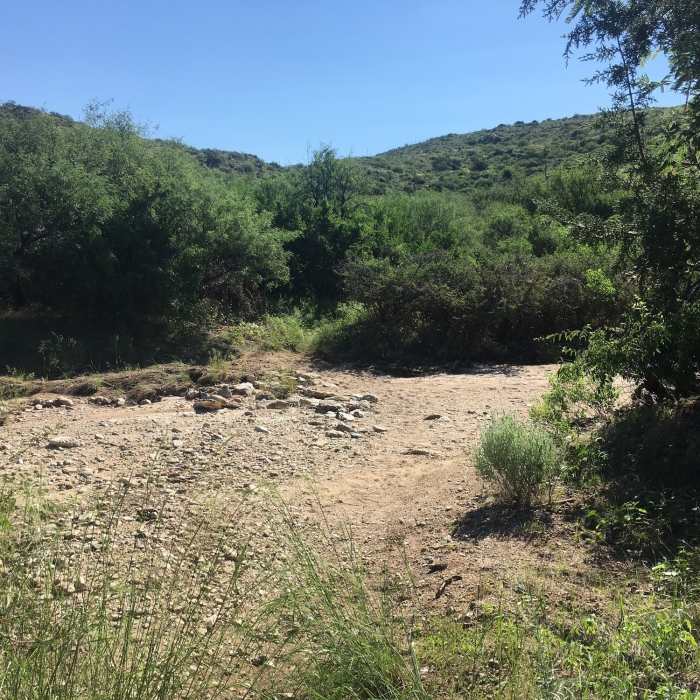 The trail crosses the wash... depending on time of year and weather can be dry or full and flowing really well. Near Bridal Wreath Falls Trail