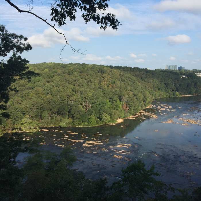 View from the overlook point facing northwest across the Chattahoochee towards the Sandy Springs area. Near East Palisades Route