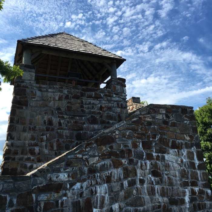 Wayah Bald Fire Tower stands watch over dense forests and clouded skies. Near AT: Winding Stair Gap to Nantahala Outdoor Center (NOC)