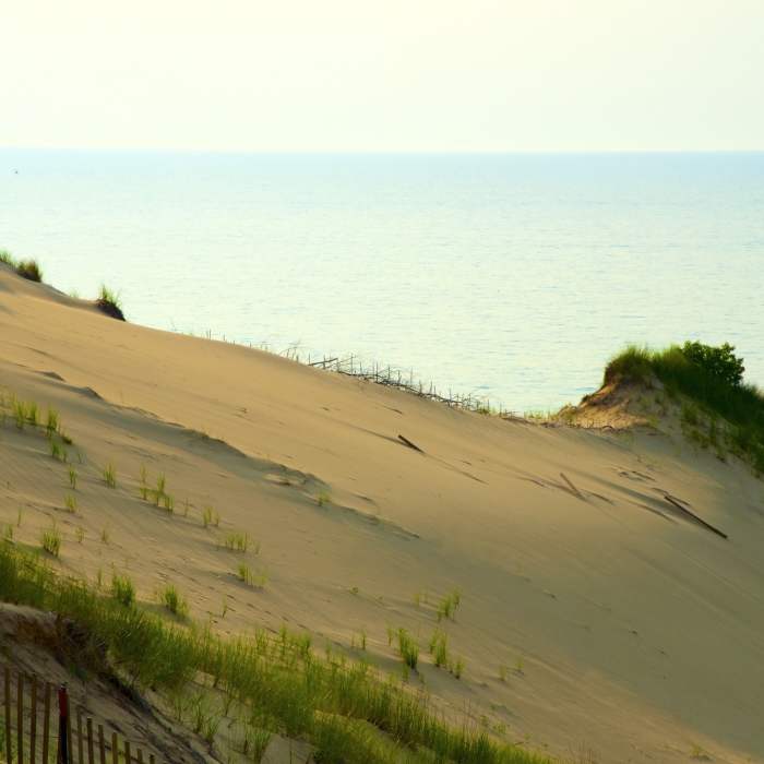 Sweeping views of Lake Michigan from the top of Mt. Baldy during a ranger-led tour. Near Mt. Baldy Summit Trail
