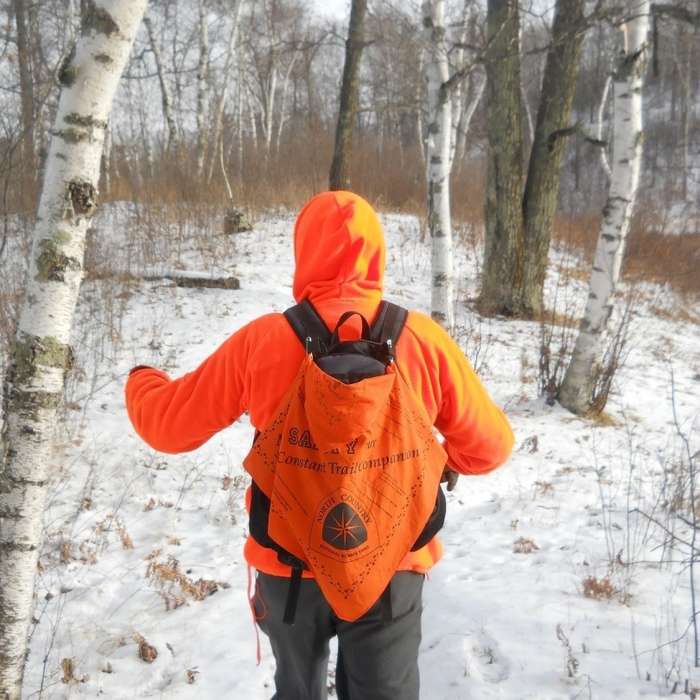 Be sure to wear blaze orange in the fall during hunting season Near Lakes Nelson & Twentyone Loops
