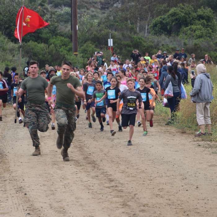 Marine Volunteers leading the kids for a run. Near Lake O'Neill Loop