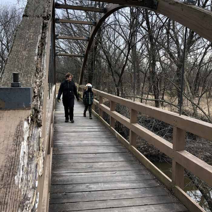 This bridge across the Cowskin Creek is the location of many family photos. Near Swanson Park